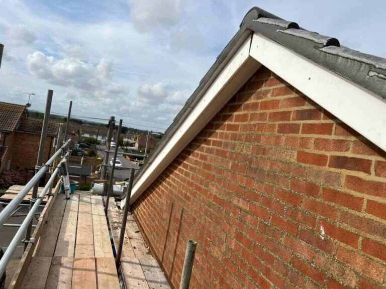 This is a photo of the gable end of a roof with newly installed roof tiles, and it also shows the new facias and soffits.